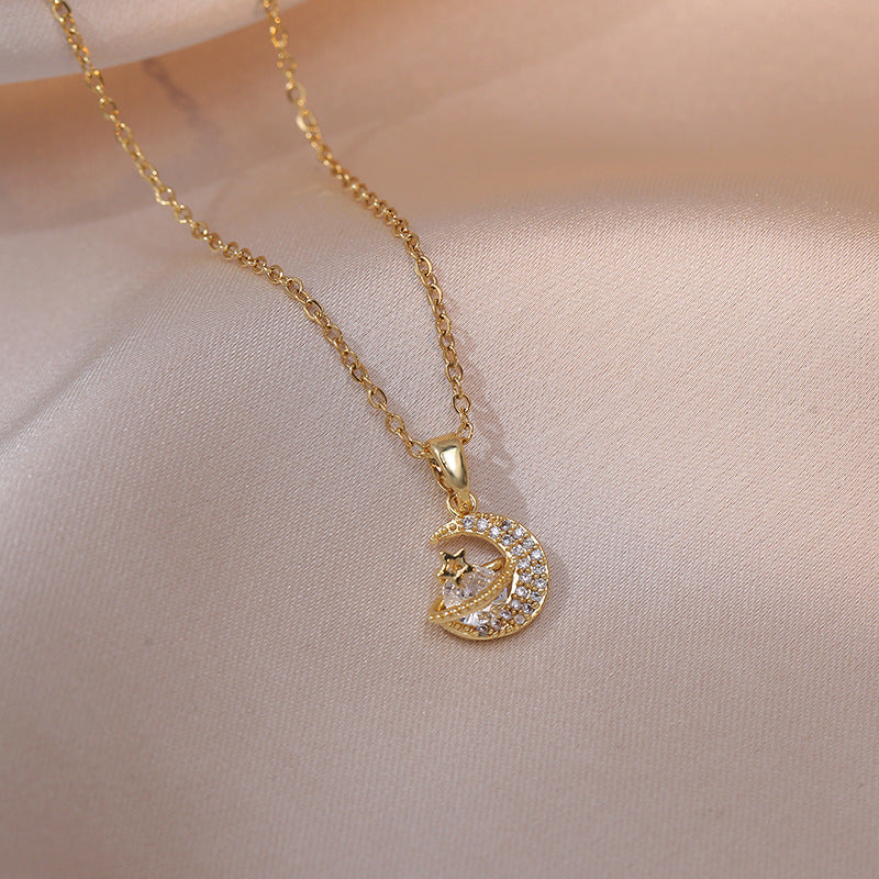 A Celestial Masterpiece to Adorn Your Neckline by Maramalive™, a silver and gold necklace with a cat on it.