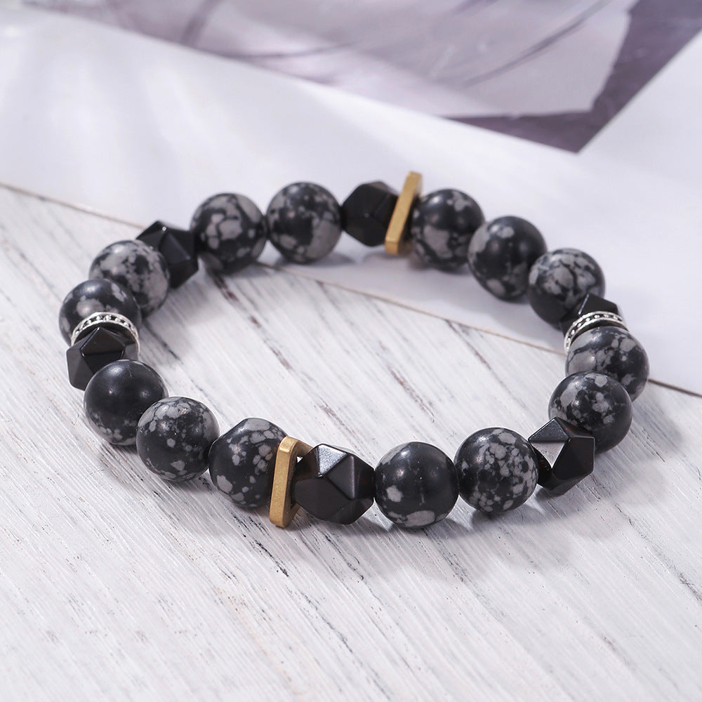 A Vintage 10mm Volcanic Rock Beaded Braided Rope Bracelet Men by Maramalive™ with black and gold beads.