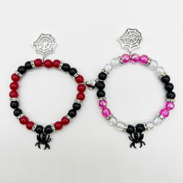 Two Maramalive™ Bewitching Baubles for Two adorned with spider charms, perfect for Halloween haunt.