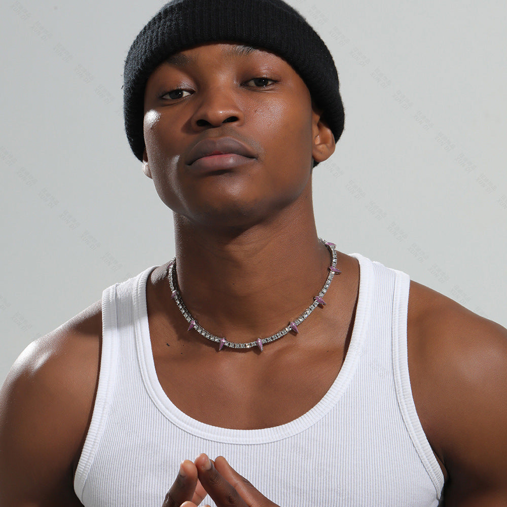 A black man wearing a black tank top and a black beanie accessorized with a Maramalive™ Men's Fashion Casual Diamond Inlaid Clavicle Chain or silver blue Cuban link chain.