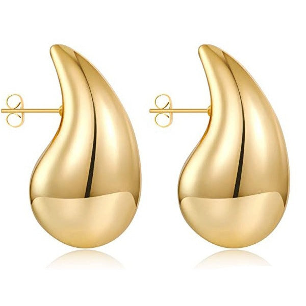 A pair of Minimalistic Water Drops Earrings Temperament Wild 14K Gold Plated Glossy by Maramalive™ on a white plate.