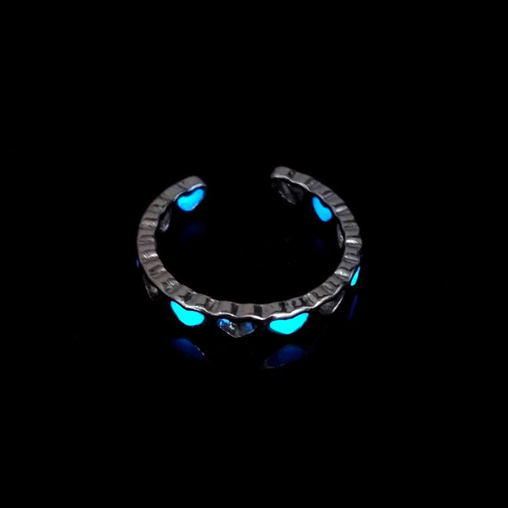 A Maramalive™ Creative Glow Accessories Personalized Creative Luminous Ring on a black background.