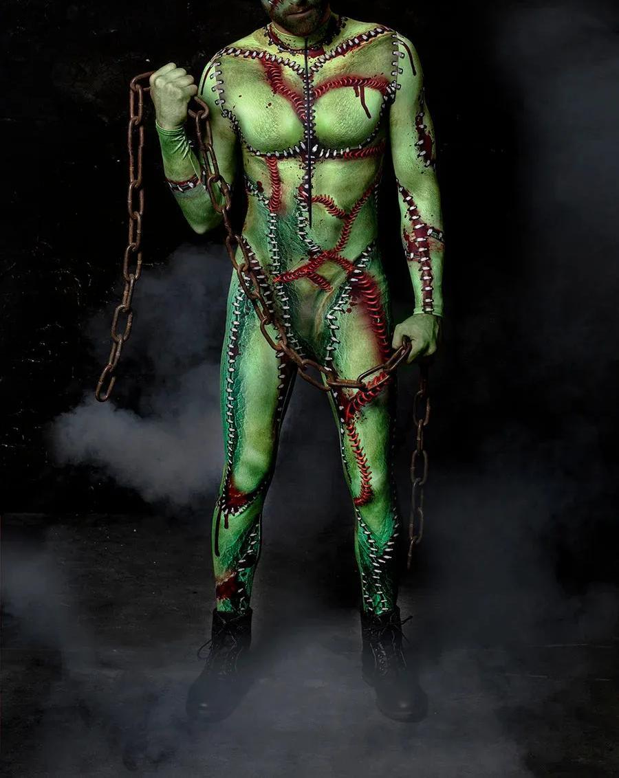 A person in a green and red Maramalive™ Halloween New Tights 3D Digital Printing One-piece Play Costume, holding a chain, stands amid smoke in a dark environment, showcasing bold street fashion.