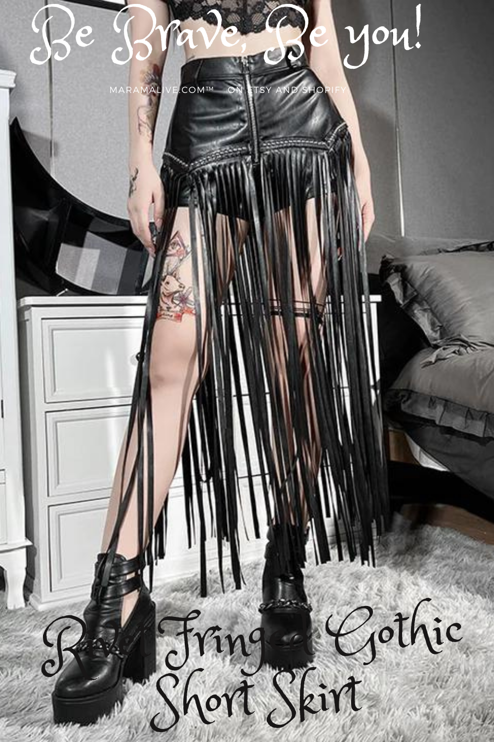A woman wearing a Maramalive™ Rivet Fringed Gothic Short Skirt.
