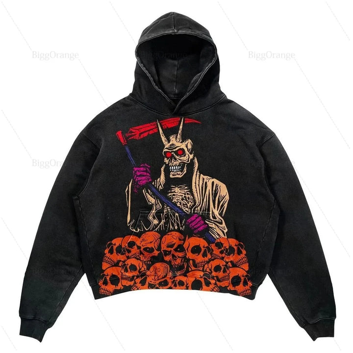 A black print skull hoodie featuring a graphic of a skeleton holding a red scythe, standing over a pile of orange and red skulls. The skeleton, with its red eyes and hooded cloak, gives this Maramalive™ Explosions Printed Skull Y2K Retro Hooded Sweater Coat Street Style Gothic Casual Fashion Hooded Sweater Men's Female an eerie yet stylish vibe.