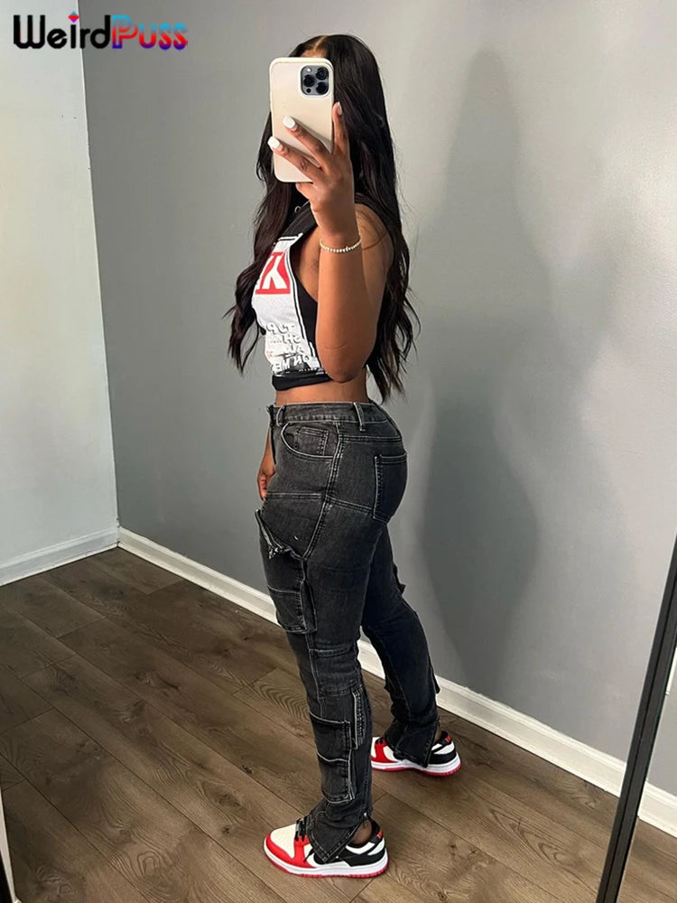 Person taking a selfie in a mirror, wearing a black "Classic Print Women Tank Tops Sleeveless Pullover Hipsters Hip Hop Streetwear Y2K Causal Basic Wild Comfortable Vest" from Maramalive™, dark jeans with pockets, and red and white sneakers. The wall is grey and the floor is wooden. "Maramalive™" logo visible in the corner.