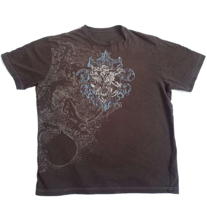 A dark brown Mall Goth Cyber Grunge 00s Retro Tee Emo Vintage Brown Y2K Graphic Print T-shirt Women Men Short Sleeve O Neck Tops Clothes with an intricate design featuring a blue crest and abstract patterns on the front. This Maramalive™ graphic T-shirt showcases visible white stitching along the seams, making it a standout piece for summer tops.