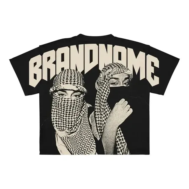 Oversized black t-shirt featuring two women with patterned headscarves and the word "Maramalive™" in large uppercase letters at the top, bringing a vintage Y2K flair to your hip hop wardrobe.