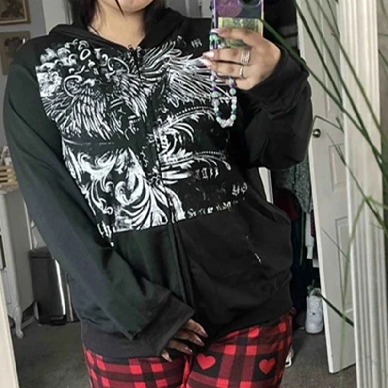 Person taking a mirror selfie wearing a Maramalive™ E-girl Gothic Dark Academia Sweatshirts Grunge Punk Letter Wings Graphic Zip Up Hoodie Y2K Aesthetic Mall Goth Coat with red plaid pants with heart patterns.