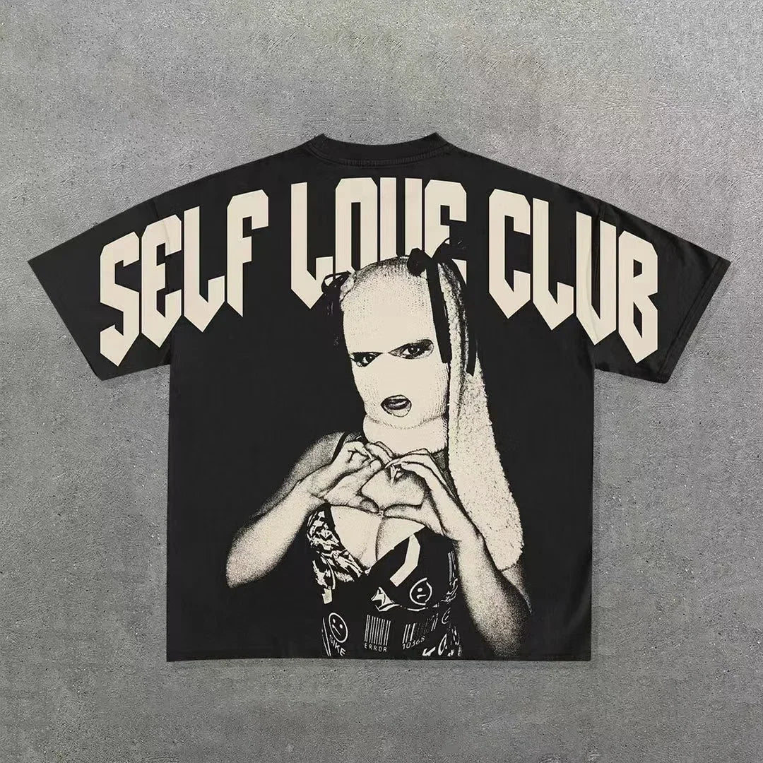 An oversized black t-shirt with the text "SELF LOVE CLUB" printed in large, bold letters and an image of a masked person making a heart shape with their hands on the back, blending Maramalive™ Punk Hip Hop Graphic T Shirts Mens Vintage Y2k Top Goth Oversized T Shirt Fashion Loose Casual Short Sleeve Streetwear vibes.