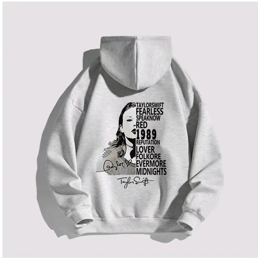A grey hoodie, perfect for autumn and winter, features a graphic of a person, a list of album titles, and "Taylor Swift" written in cursive at the bottom. This casual men's hoodie is made from soft polyester for ultimate comfort. Introducing the Autumn Winter Hoodies For Men Women Sweater Taylor【Mindnights】Album Print Sweatshirt Unisex Pullovers Hooded Hip Hop Streetwear by Maramalive™.