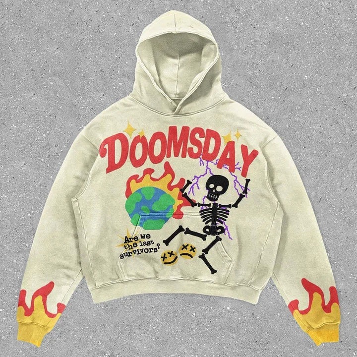A beige Maramalive™ Explosions Printed Skull Y2K Retro Hooded Sweater Coat Street Style Gothic Casual Fashion Hooded Sweater Men's Female in punk style featuring the word "DOOMSDAY" in red, a skeleton graphic, a globe, and flames on the cuffs. Text reads "Are we the last survivors?" Perfect addition to men's clothing for those who love bold statements.