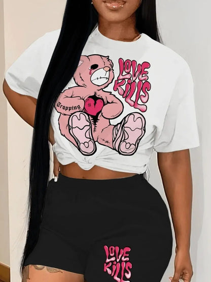A person wearing a white t-shirt from Maramalive™ with a graphic of a pink teddy bear and the words "Love Kills," paired with black shorts featuring the same phrase, perfect for a casual style and high stretch comfort. This ensemble is the LW Plus Size Summer Casual 2 Piece Set Letter Print Shorts Set 2 Piece Outfit O Necke Short Sleeve T Shirt Top with short pants.