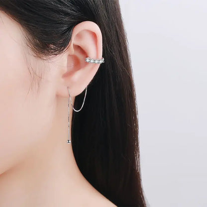 Luxury Moissanite Earrings worn by a model with long black hair