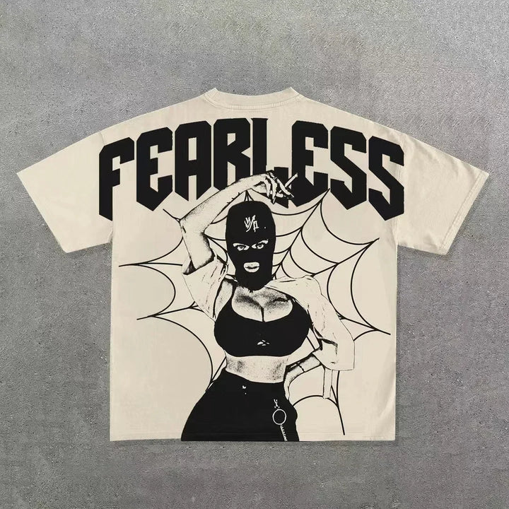 A vintage Y2k beige t-shirt featuring a black and white graphic of a woman in a balaclava posing against a web-like background, with the word "FEARLESS" boldly emblazoned on the back. This Maramalive™ Punk Hip Hop Graphic T Shirts Mens Vintage Y2k Top Harajuku Goth Oversized T Shirt Fashion Loose Casual Short Sleeve Streetwear merges punk hip hop vibes effortlessly.