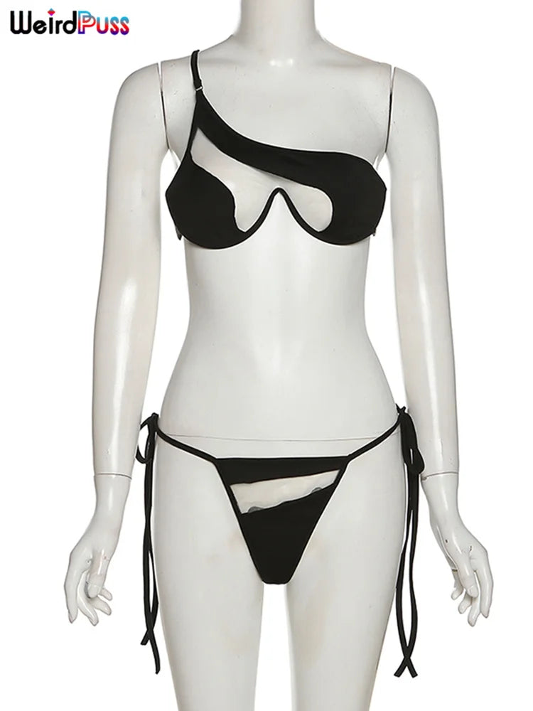 A mannequin is dressed in a Maramalive™ Beach Style Women Bikini 2 Piece Set Sexy Mesh Patchwork One Shoulder Bra Top+Bandage Briefs Vacation Trend Clubwear, perfect for Summer 2022's sexy clubwear trends.