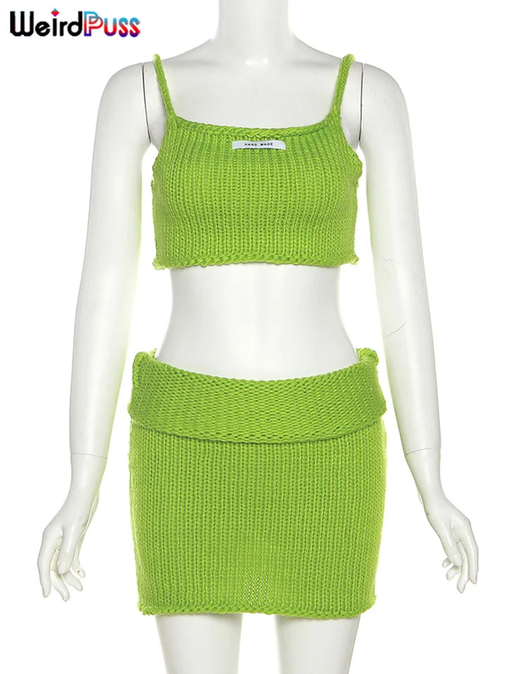 Mannequin displaying the Elegant Sweater Two Piece Set Women Chic Solid Hipster Summer Trend Camisole+Lapel Skirts Streetwear Matching Outfits by Maramalive™, a lime green knitted two-piece outfit with a crop top and mini skirt, perfect for casual women's wear.