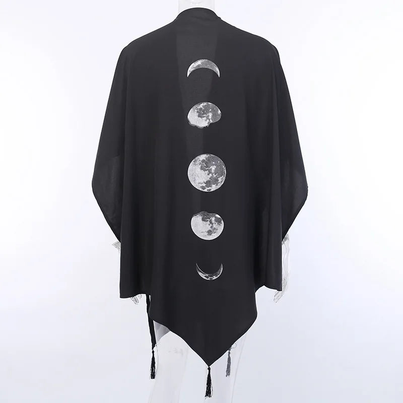 A Gothic Black Retro Moon Print Tassel Cloak Female Autumn and Winter Dark V-neck Loose Top Bat Cloak Goth Jacket Women by Maramalive™, featuring a design of the moon's phases down the back, displayed on a white mannequin.