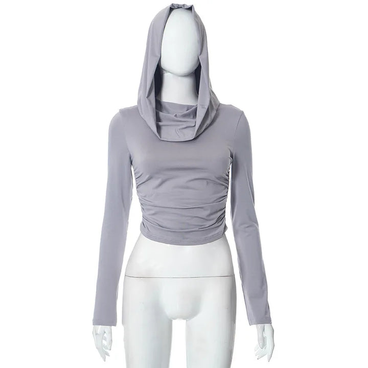 A mannequin is dressed in a light gray, Maramalive™ 2023 Women Fashion Tight Jogging Sports Hoodie Autumn Solid Color Casual Hooded Long Sleeve Slim Pleated Top Urban Style, featuring long sleeves and an attached hood.