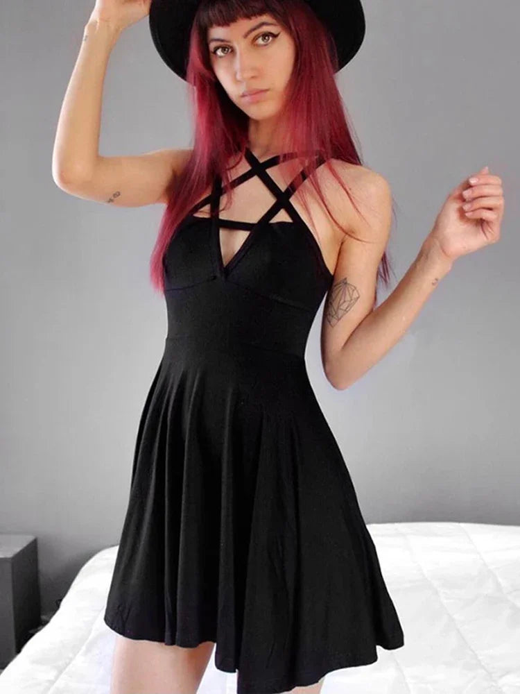 Model in dark Gothic punk strap dress