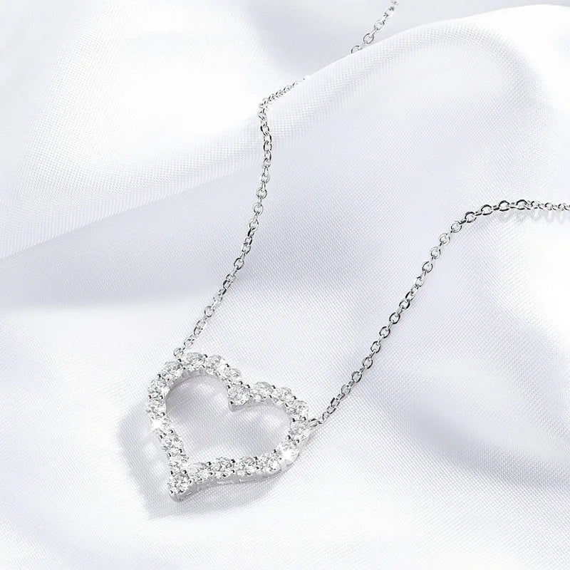 Silver plated moissanite heart necklace for women.