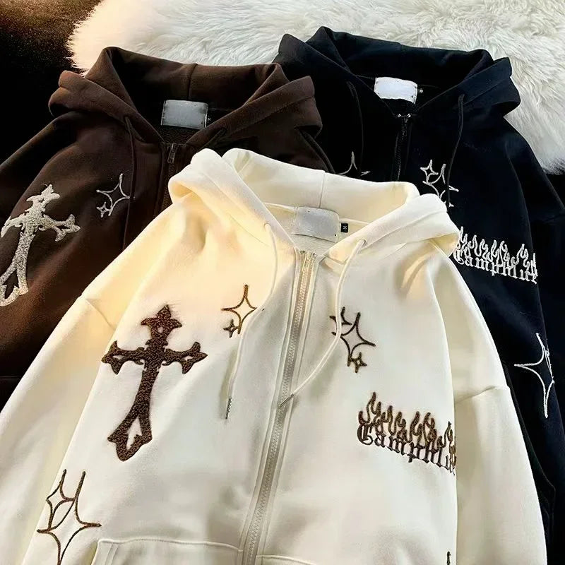 Three Maramalive™ Embroidery Sweatshirt Women Oversized Zip-Up Hoodies Gothic Hip Hop Hooded Streetwear Female Hoodie Y2k Full Jackets are laid out on a surface: one brown, one white, and one black. Each hoodie features various embroidered designs, including crosses, stars, and flame patterns, embodying the unique Harajuku embroidery sweatshirt style.