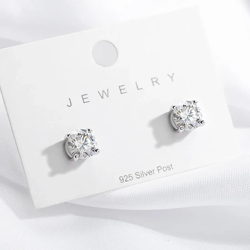 Bride's silver stud earrings for wedding.