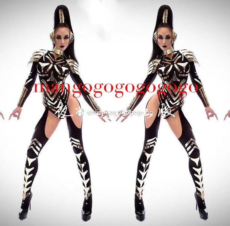 Two people in matching futuristic black and white bodysuits with high ponytails and heavy makeup, standing with hands on hips, facing forward. The text "Personality Black Gold Bodysuit Sexy Female Costume Singer Nightclub Bar Dance Party Club Birthday Performance Halloween Outfits by Maramalive™" is overlaid on the image, showcasing daring nightclub fashion perfect for a bar party stage.