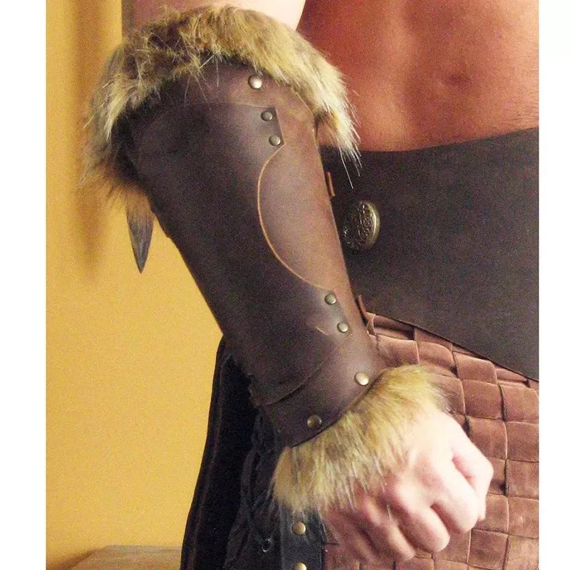 A person wearing a Medieval Viking Warrior Leather Bracer Steampunk Fur Accents LARP Costume for Men Women Riveted Arm Armor Halloween Accessory by Maramalive™ and a woven leather belt, perfect for completing any pirate costume. The photo shows their arm, waist, and torso adorned in these movie & TV accessories.