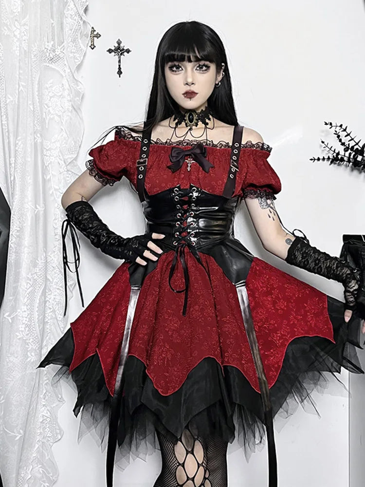 Model wearing a Victorian Gothic black and red lace dress, puffed sleeves. With a corset on top