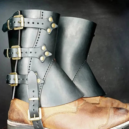 A pair of Maramalive™ 1 Pair Medieval Knight Warrior Gaiters Armor Leather Boot Shoes Cover Waterproof Leg Guards Renaissance Costume Accessory Larp, fitted with black leather spatterdashes, reminiscent of faux leather gaiters, featuring three brass buckles on each.