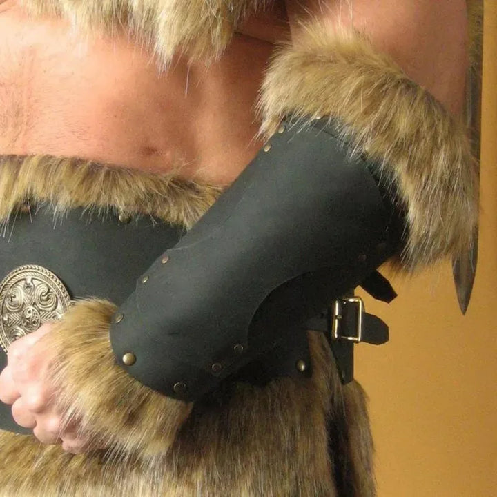 Close-up of a person wearing a fur and leather pirate costume, featuring a Medieval Viking Warrior Leather Bracer Steampunk Fur Accents LARP Costume for Men Women Riveted Arm Armor Halloween Accessory by Maramalive™ on their arm, a decorated belt around their waist, and hints of faux leather vest details. These striking elements make it perfect for Movie & TV Accessories collections.