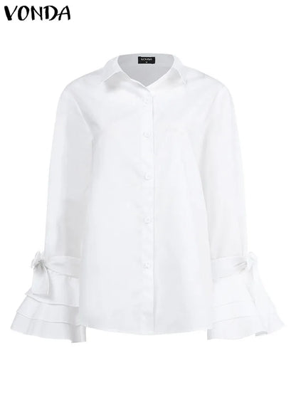 A white long-sleeved button-up blouse with ruffled cuffs and bow details at the wrists. The brand name "Maramalive™" is visible at the neckline, making this New Women Shirts Spring Summer Sexy Turn-down Collar Flare Sleeve Party Tops Office Shirt Casual Blusas a chic addition to any wardrobe.