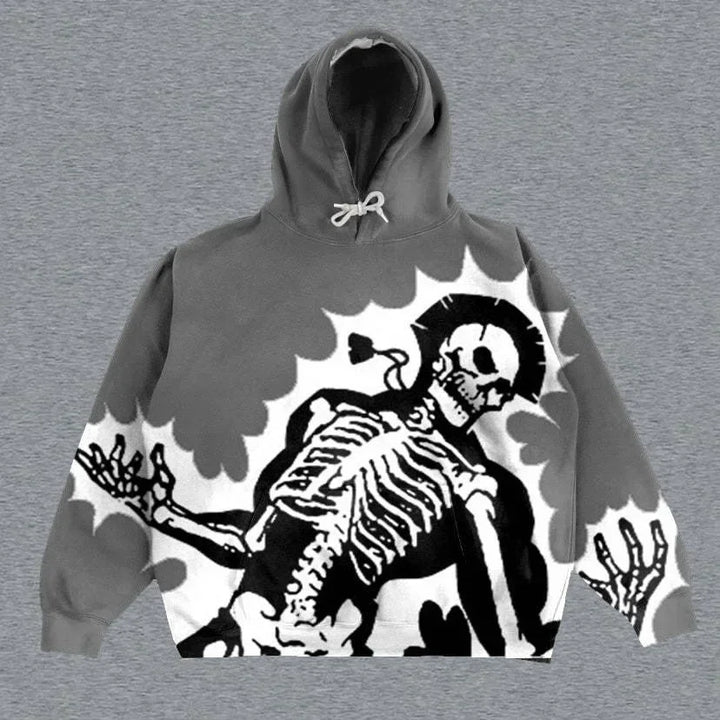 A gray hoodie featuring a large black and white graphic of a skeleton in an expressive pose, surrounded by a billowing pattern, perfect for those embracing Punk Style in men's fashion is actually the Maramalive™ Explosions Printed Skull Y2K Retro Hooded Sweater Coat Street Style Gothic Casual Fashion Hooded Sweater Men's Female.