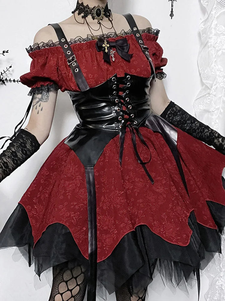 Model wearing a Victorian Gothic black and red lace dress, puffed sleeves. With a corset on top
