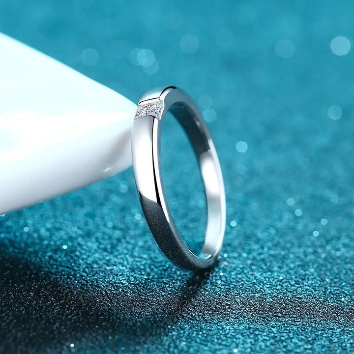 Princess cut moissanite engagement rings showcased.