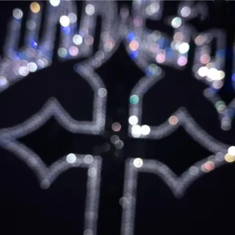 A blurry image showing a sparkly, abstract design with light reflections, possibly a logo or symbol on a casual Maramalive™ Men Y2K Fashion Hoodie Rhinestones letter graphics Print Zip Hoodie clothes Hoodies Goth Long Sleeve Sweatshirt Oversized Top in a dark setting. Perfect for autumn and winter wear.