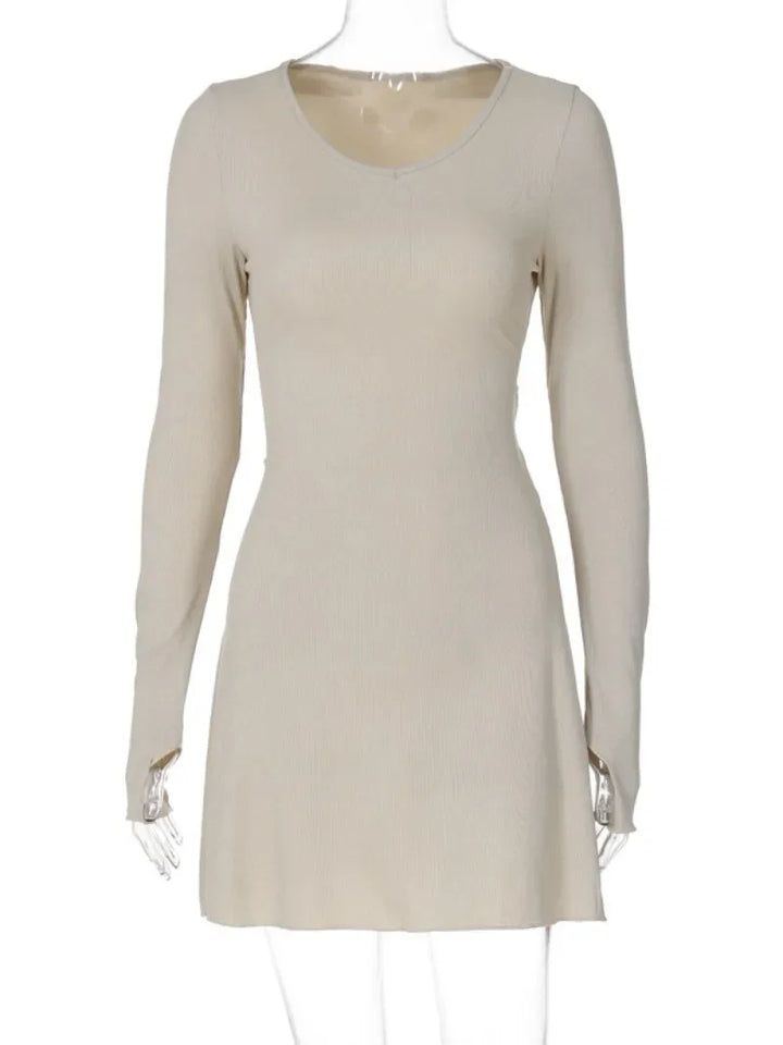 Women in white bandage mini dresses.