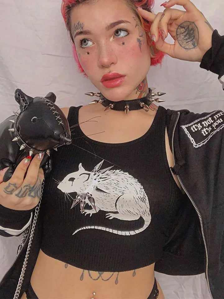 Person with red hair and facial tattoos wearing a spiked choker and a Maramalive™ Mouse Print Black Tank Goth Sexy Bodycon Cropped Tops Women Streetwear O Neck Knitted Basic Tank Top, holding a small black toy with spikes.