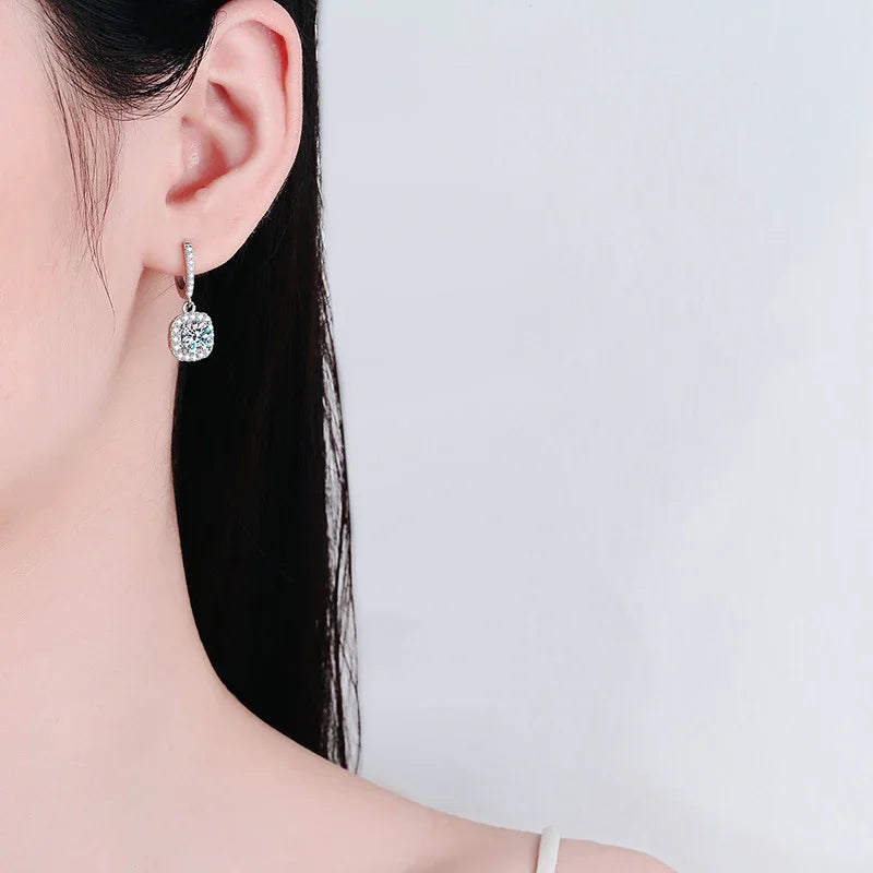 Elegant sterling moissanite drop earrings.
