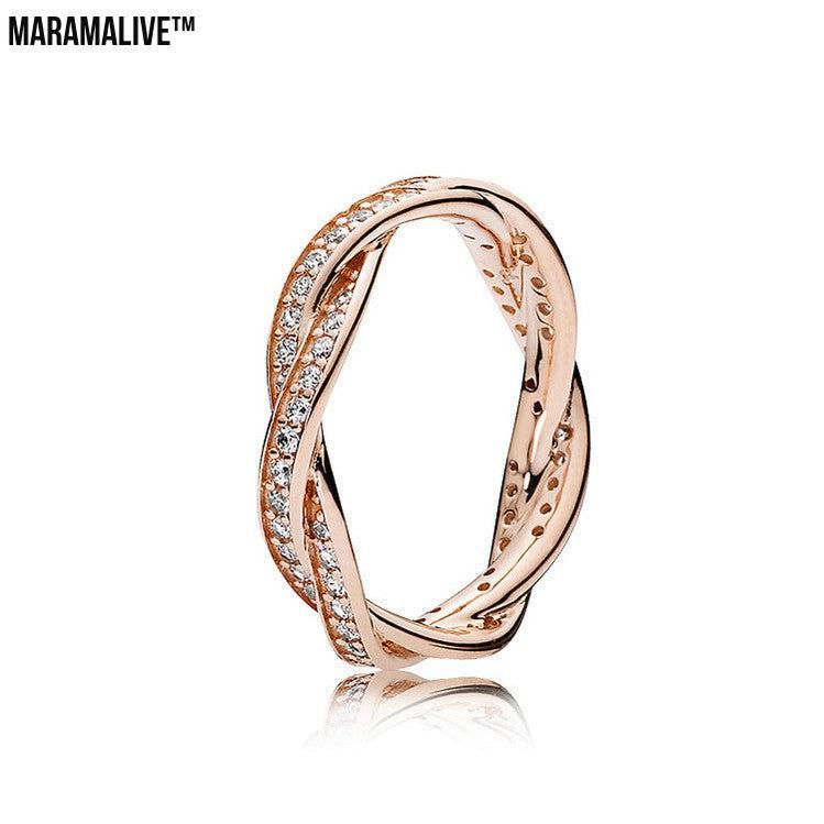 Sterling silver rose gold wheel of fortune ring