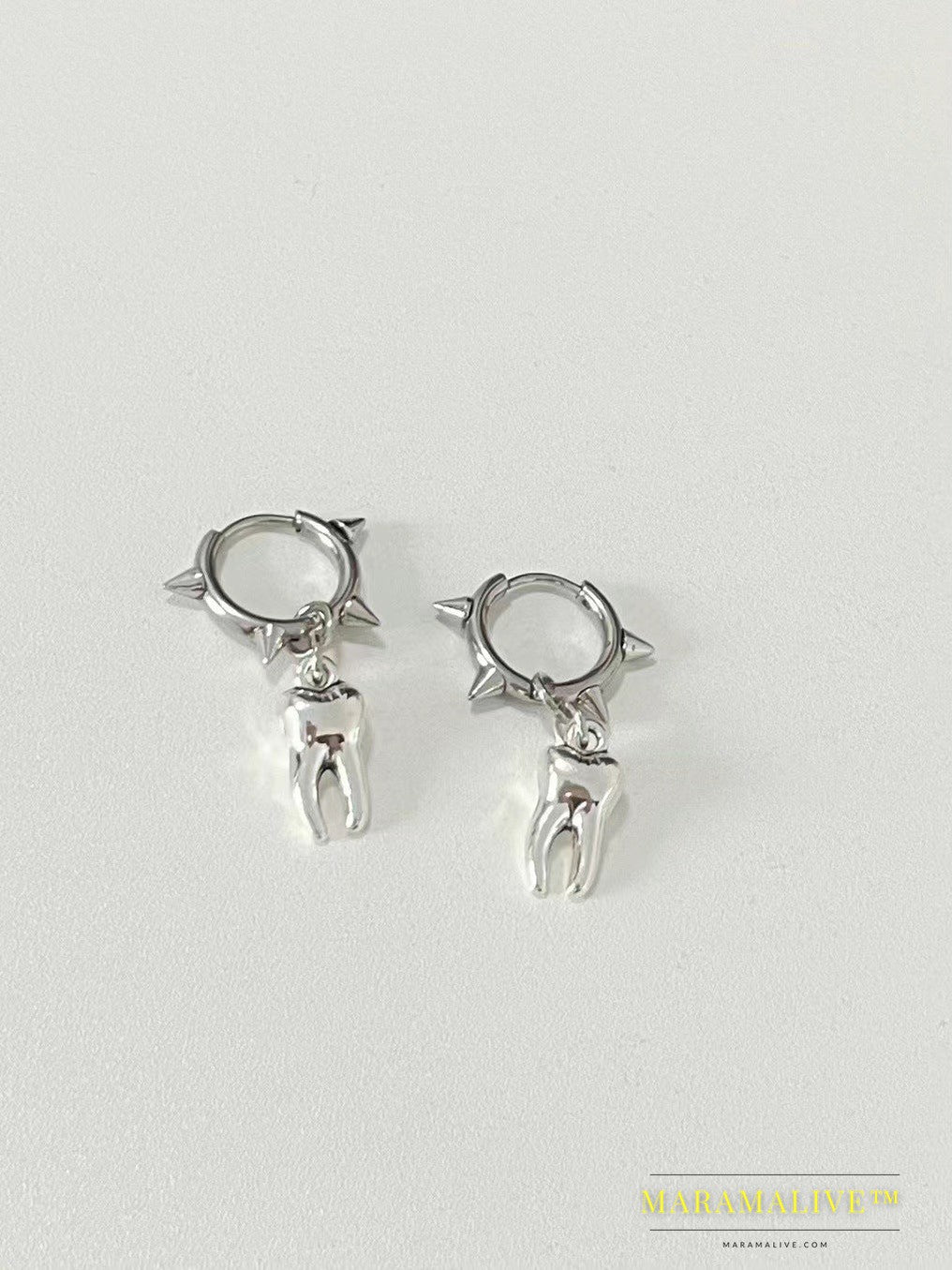 Women's Fashion Rivet Stainless Steel Tooth Earrings