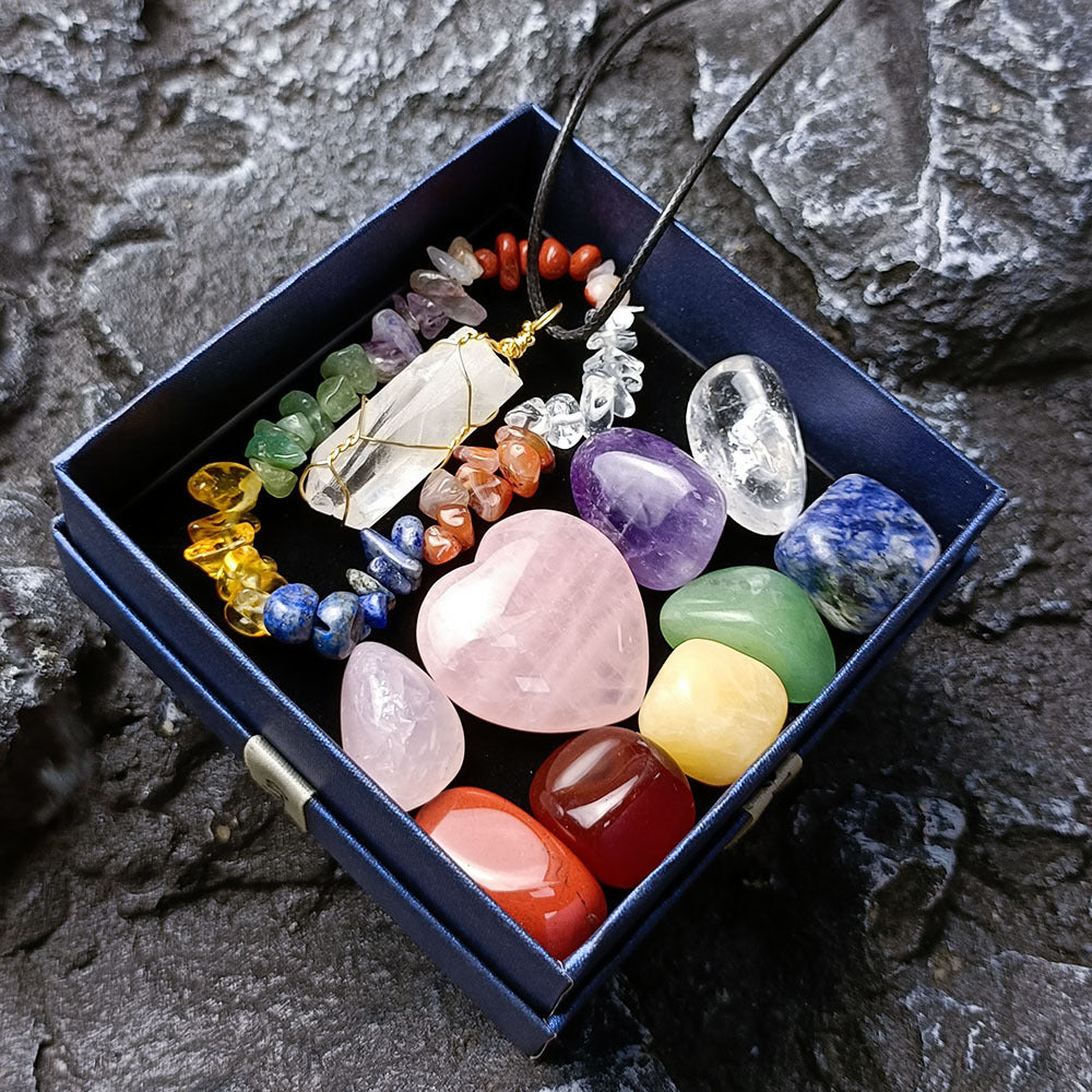 A box containing a variety of Maramalive™ Chakra Combination Love Pillar stones and crystals.