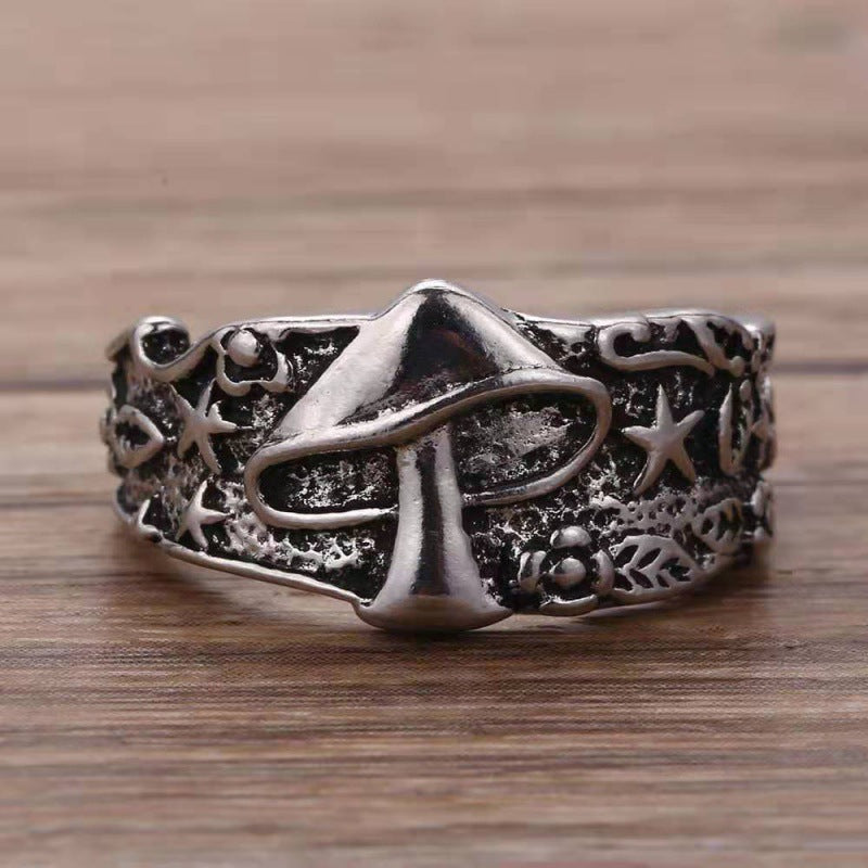 A Vintage Star Flower Pattern Ring with a mushroom and stars on it by Maramalive™.