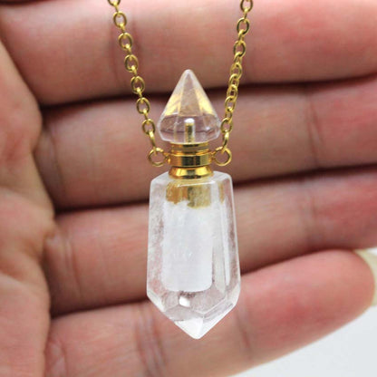Four different Crystal Perfume Bottle Necklaces with different colored crystals on them by Maramalive™.