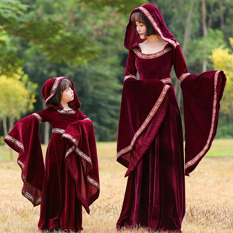A woman and a child dressed in Maramalive™'s Halloween Retro Little Red Riding Hood Vampire Witch Costume.