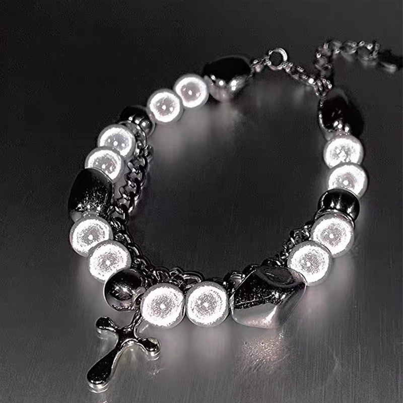 A Maramalive™ Fashion Jewelry Double-layer Reflective Pearl Cross Charmed Bracelet.