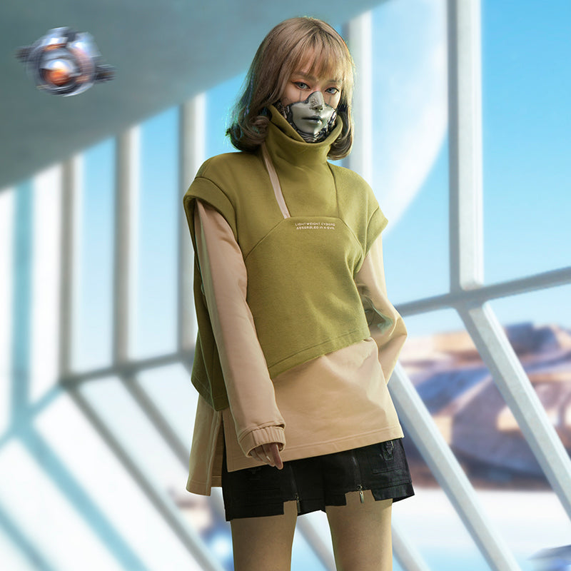 A person wearing a futuristic outfit in black and green youth fashion with a partial robot face stands indoors next to a large window with a scenic view outside. The individual is dressed in the Punk Fake Two-piece Plush And Thick High Neck Loose Top by Maramalive™. A small, hovering robotic drone is visible in the upper left corner.