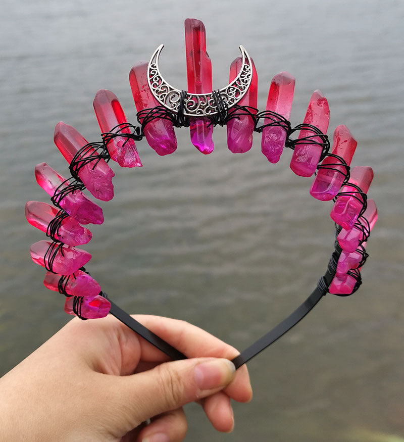 A person holding a Crystal Witch Headband with crystals on it. (Brand Name: Maramalive™)