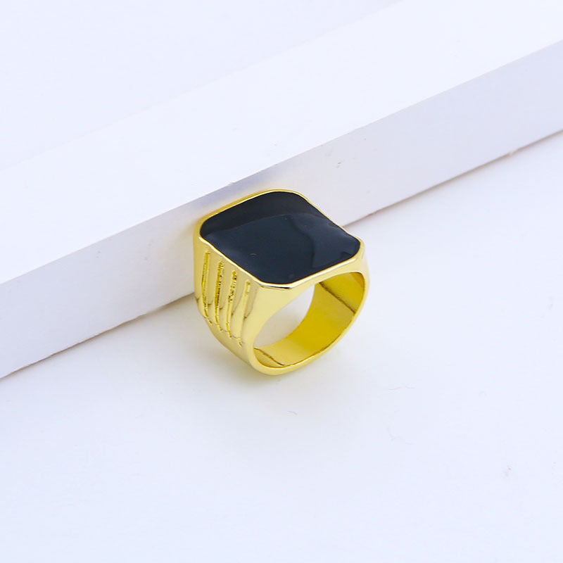 A woman wearing a Maramalive™ Fashion Creative Geometric Glossy Black Onyx Ring.